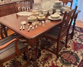 Dining Room: Square table with extra leaves and 6 chairs, area rug