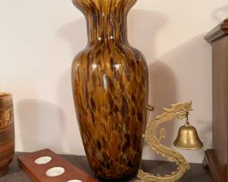 Living Room: brass dragon bell, art glass vase