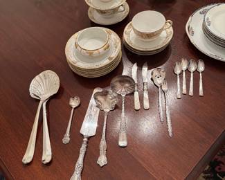 Dining Room: silverplate serving utensils, cups & saucers