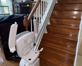 2 almost never hardly used stair chairs 