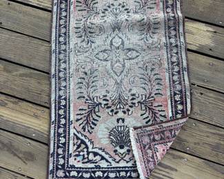 Small worn rug