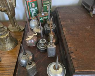 Sewing machine oil cans