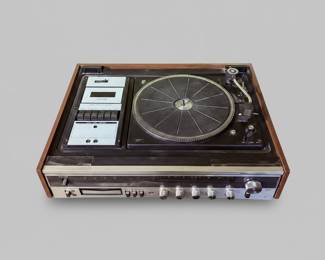 Soundesign PLL AM/FM Stereo Receiver with Turntable, 8Track and Cassette Tape.