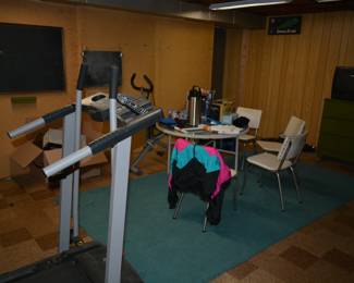 treadmill and vintage chairs for the kitchen tables
