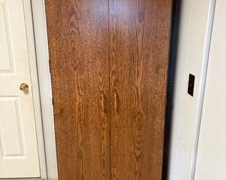 Tall storage cabinet