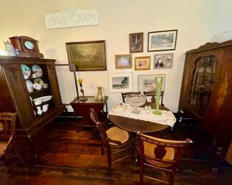 Dining Room - 2 china cabinets, tea card, tall uranium glass vase, 6 matching chairs, gate leg table