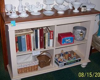 Shelving unit, cookbooks, milk glass