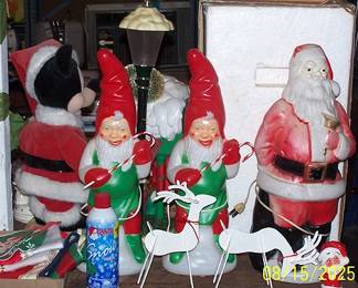 Sample of Christmas items including blow molds and Mickey Mouse