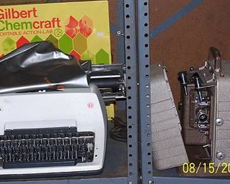 Olympia manual typewriter and Bell and Howell 8 mm projector