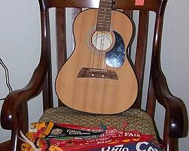 Rocker, acoustic guitar, vintage souvenir pennants