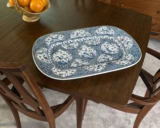 Platter shown on this table so you can get an idea of its size. There is another picture of it and also the back marking and price from Belk's years ago!