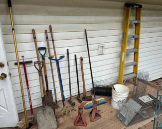 Garage has loads of tools and items for any handyman.