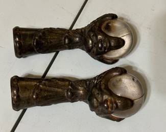 Antique claw table feet with faces
