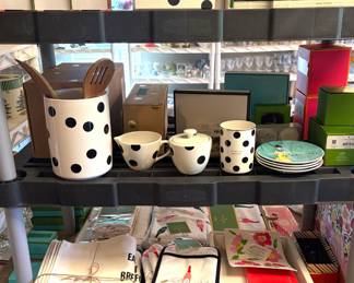 Huge collection of Kate Spade including kitchen decor, bake ware, drink ware, candles, placemats and much more!