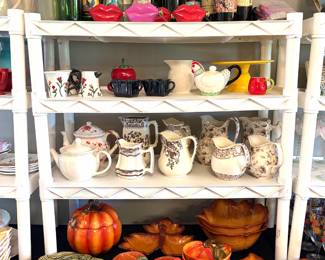 Collection of Better Homes and Garden fall platters and serving pieces, decorative wine bottles, lip flasks, and O. Godinger & Co. pitchers.