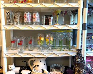 Collection of drinkware including Lolita, vintage Budweiser, Coca-Cola, hand painted glasses and tons of Kate Spade dish-ware and serving platters.
