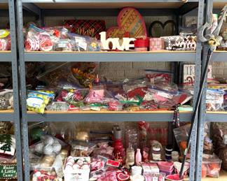 Valentine’s Day decor, ribbon, ornaments and outdoor decorative pillows. 