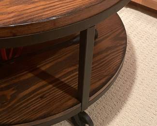 Industrial Style Round Coffee Table with Casters and Lower Shelf