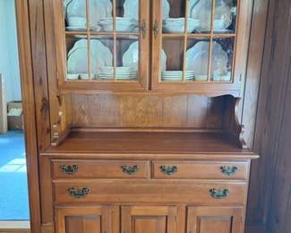 Two piece vintage Sterling House Furniture maple china hutch