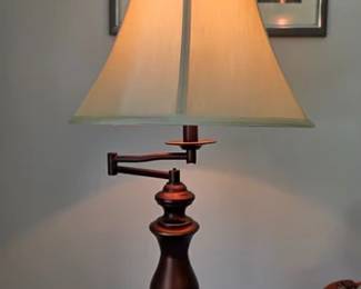 Swing arm floor lamp