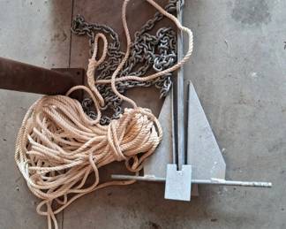 New galvanized steel boat anchor, a length of heavy anchor chain and nylon anchor rope