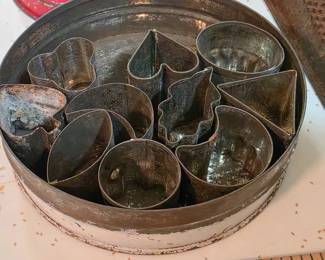 Vintage tin with mini cookie cutters