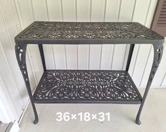 Cast aluminum console table