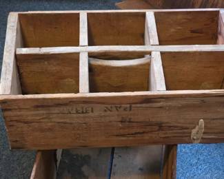 Antique wood crates, this one with unique center handle design