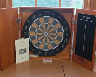 Dart board in modern wall cabinet