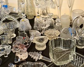 A beautiful variety of cut, pressed, frosted, and hand-blown-style glass