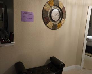 Dark brown vinyl settee original price $199 our price $80