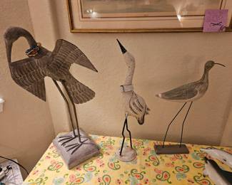 Be careful raising the bird on the left the torso comes off of the legs for easy transport $30 the second statue $12