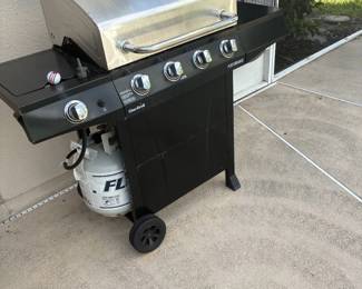 Very clean barbecue with a extra burner on the left, $150