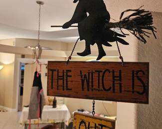 Just in time for Halloween this wooden hanging witch sign $5