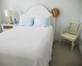 Queen bed; nightstand; table lamp; accent chair