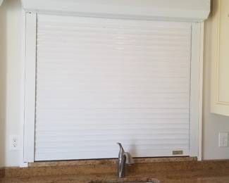 Electric hurricane shutters