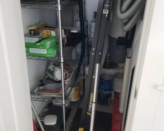 Household supplies; metal rack; step ladder