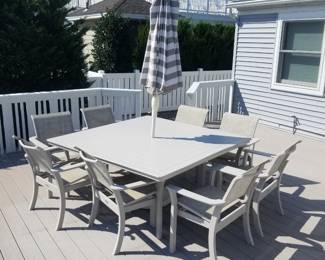Patio dining set by Telescope seats 8