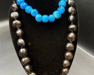 Chunky Beaded Necklaces Featuring A Hawaiian Kukui Nut Lei