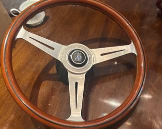 Wooden steering wheel etched with Enrico Nardi signature 