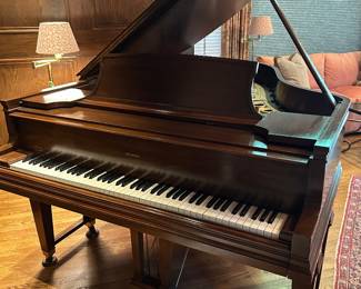 1929 Steinway Player Grand piano with AEOLIAN DUO-ART player mechanism. Original ivory keys are all intact with no chips or cracks. Walnut case in excellent condition. Includes 29 piano roles. Signed by Vladimir Horowitz.
