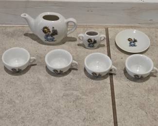 Vintage Miniature tea set with 4 cups, tea pot, creamer and plate