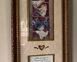 lots of framed artwork