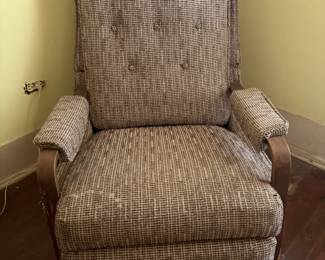 Nice upholstered rocker with wooden rolled arms