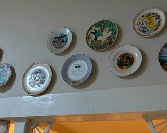 Decorative wall plates from different states and collectables