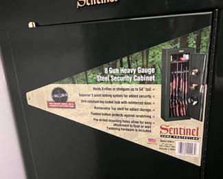 H121 - $75. Sentinel 8 Gun Security Cabinet. Model GCW-8. Key Lock Only. Measures 21" W x 10" D x 55" Tall.
