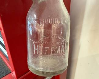 H118 - $40. Huffman 1 Quart Oil Bottle with 3 lids.
