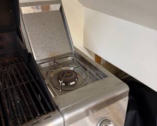 H109 - $150. Nexgrill 4 Burner with Cover and Propane Tank.