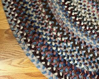 H26 - $55. Braided Area Rug.