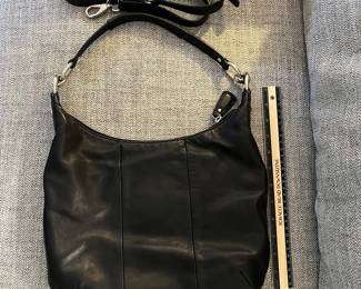 H92 - $55. Black Coach Kristin Hobo Purse. Outside shows some wear. Inside has some staining.